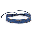Handmade denim fabric wristband carrying strap in mixed materials with adjustable closure