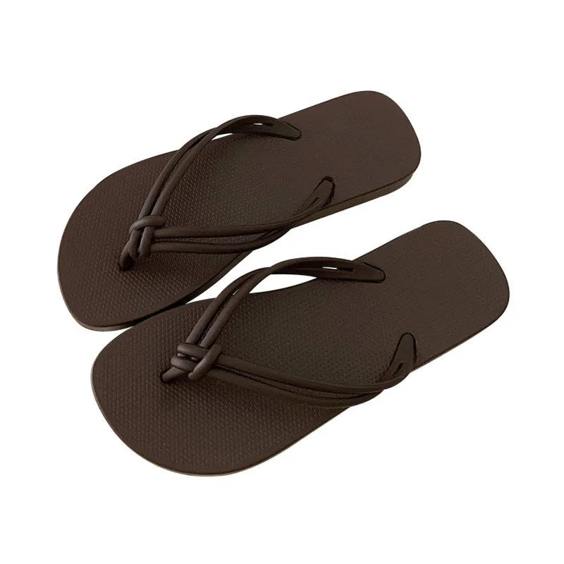 Men's closed-toe PVC flip flops in multiple colours on a plain background.