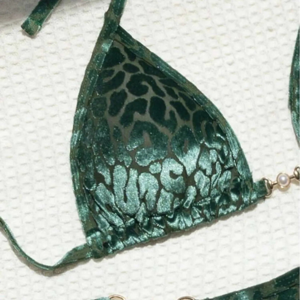 Women's leopard print swimsuit bikini in blue on yellow background