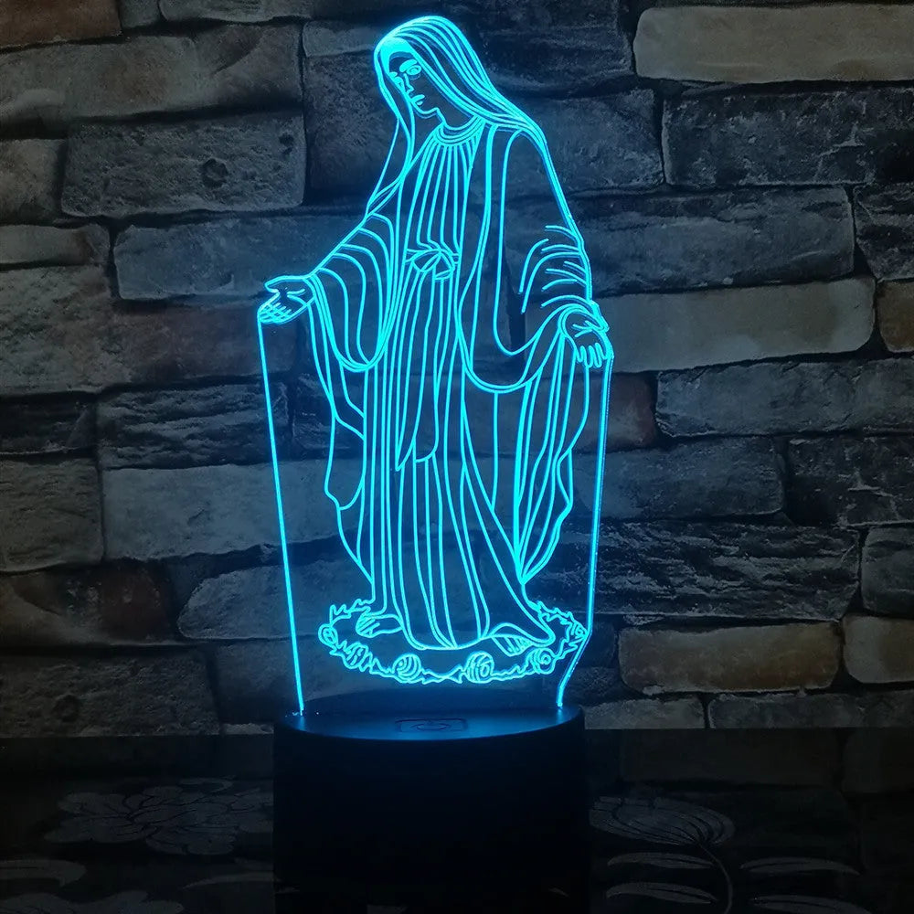3D LED night light showing illuminated blue dual-ring pattern on acrylic plate with black ABS base.