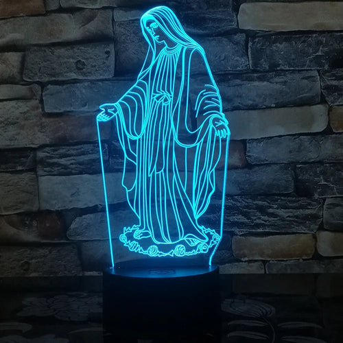3D LED night light showing illuminated blue dual-ring pattern on acrylic plate with black ABS base.