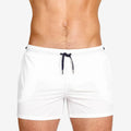 Polyester sports shorts with mesh lining in Army Green colour on a white background.