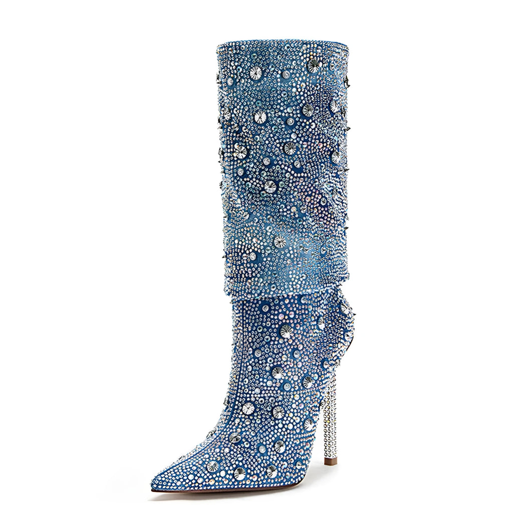 Women's blue denim pointed toe heel boots with stretchy fit on a plain background