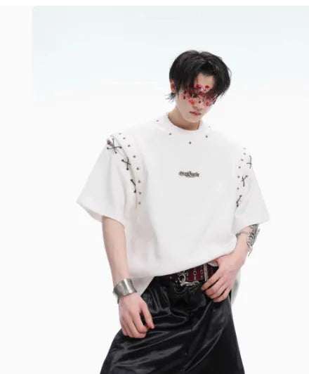 Women's black deconstruction lace-up cutout short sleeve t-shirt on a hanger.