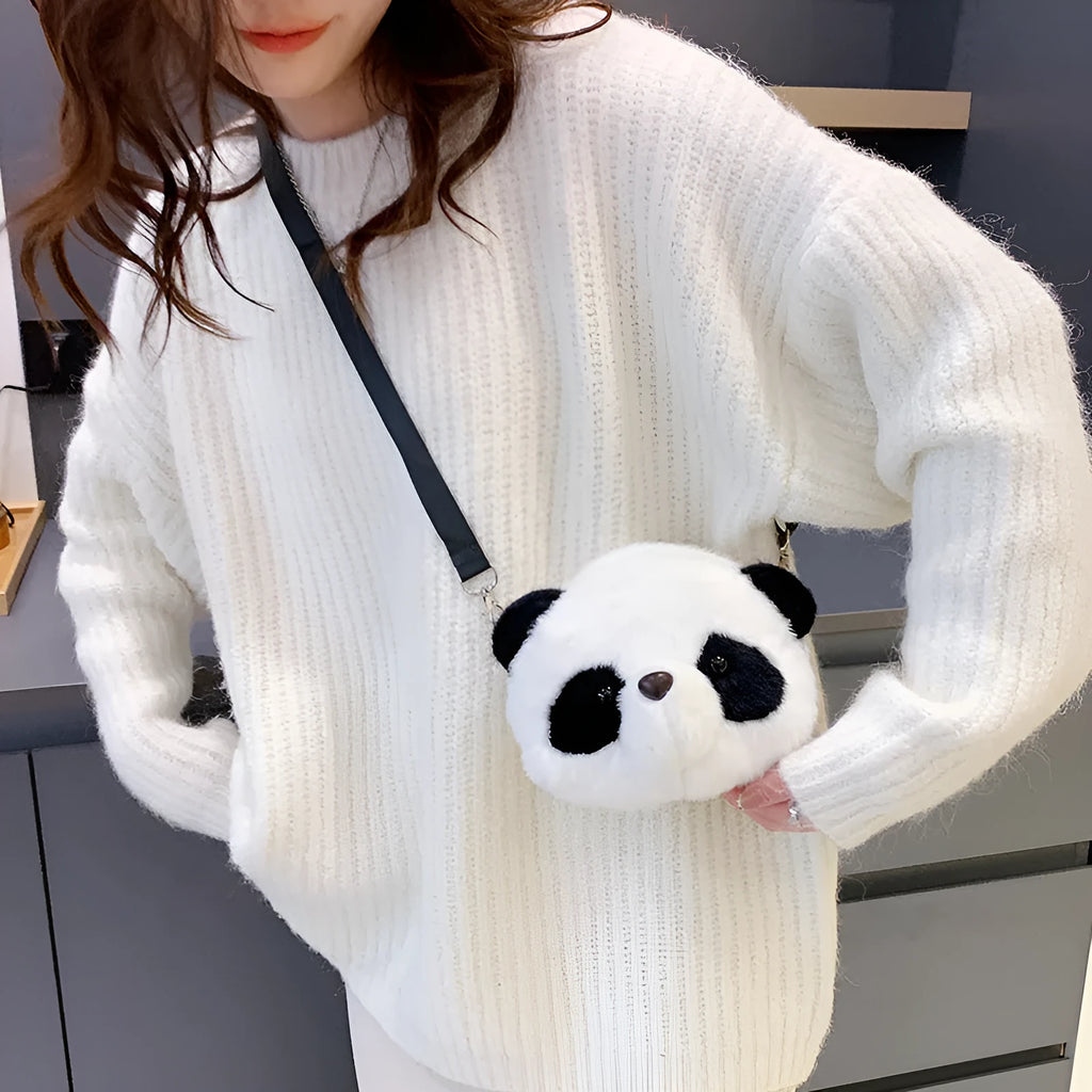 Plush panda head crossbody bag showing cylindrical shape and sandwich pocket organisation