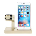 White 2-in-1 charging dock holding an iPhone and an Apple Watch on a wooden desk.