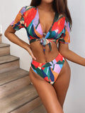 Red women's split swimsuit with print for swimming and casual surfing.