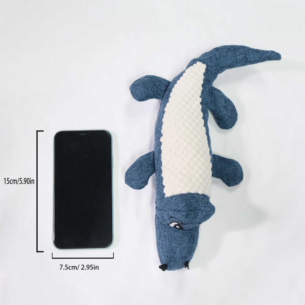 Blue corn-shaped plush dog toy with grid texture on a white background.