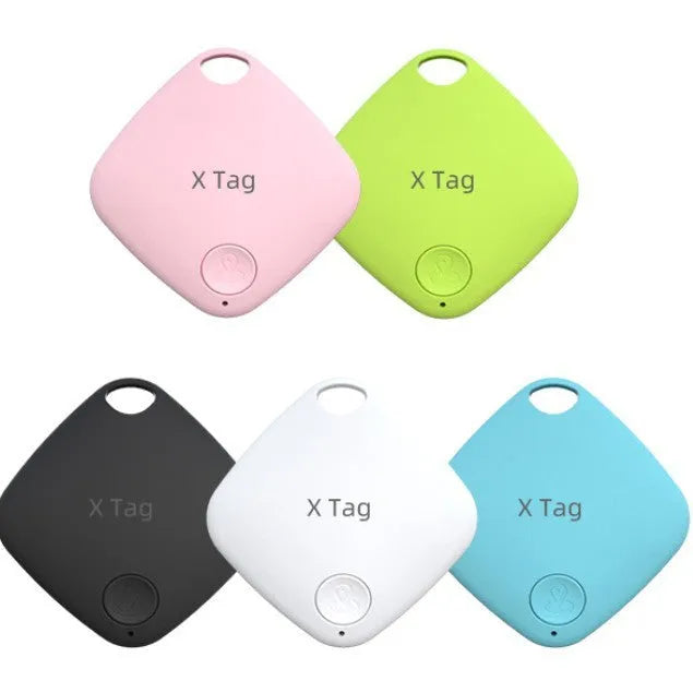 Small round black Bluetooth key ring tracker with a silver metal keyring loop.