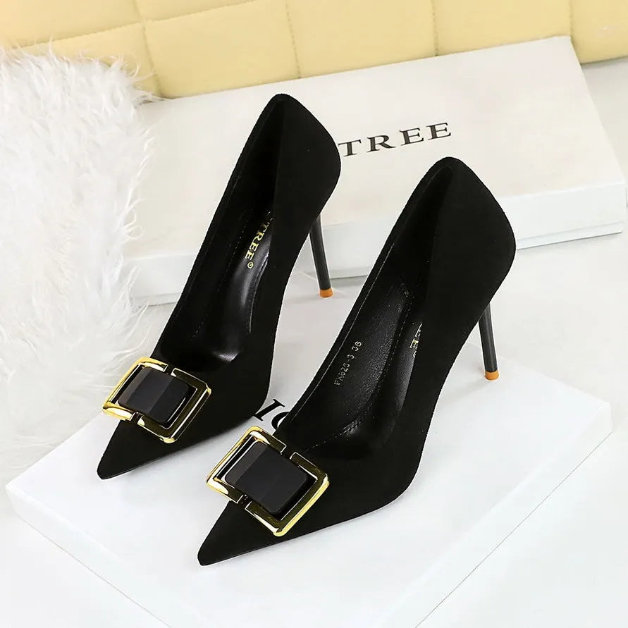 Black suede women's stiletto high heels with a 9cm heel and pointed toe on a rubber sole.