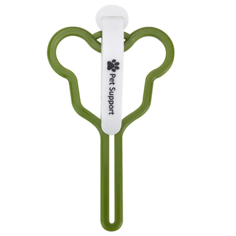 Hands-free dog poo bag holder with velcro strap attached to a dog lead.
