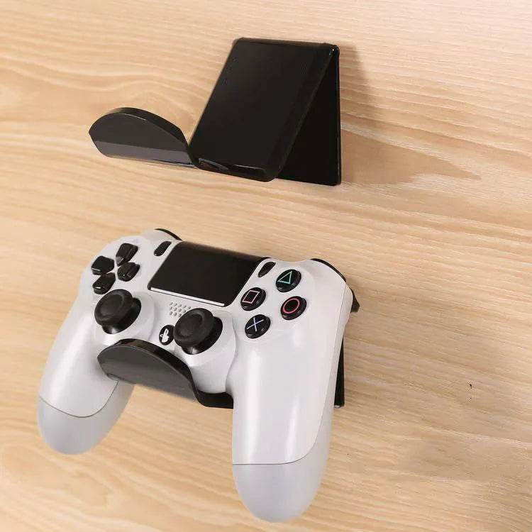 Universal game controller mounting bracket in black colour mounted behind a door
