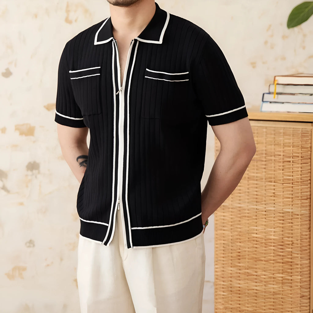 Slim fit black polo shirt with short sleeves and a lapel collar on a mannequin.
