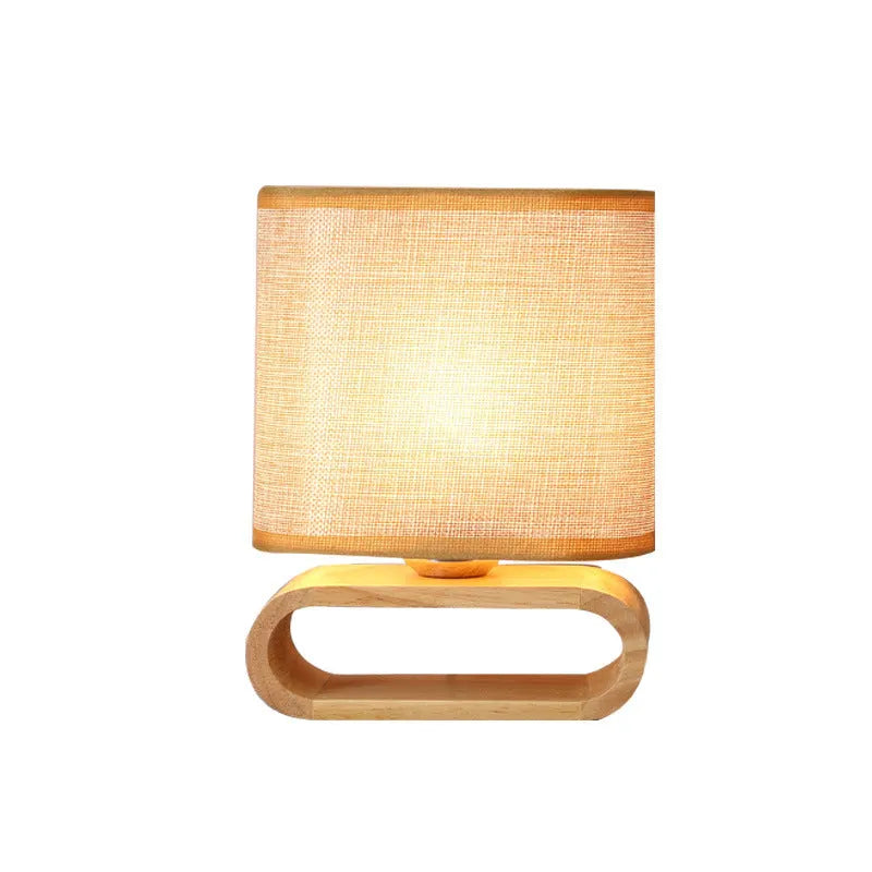 Nordic Japanese bedside table lamp with rubber wood holder, Φ170mm by H230mm, on a nightstand