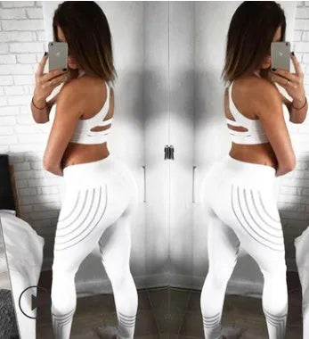 Women's black workout leggings with glowing print pattern, slim fit design