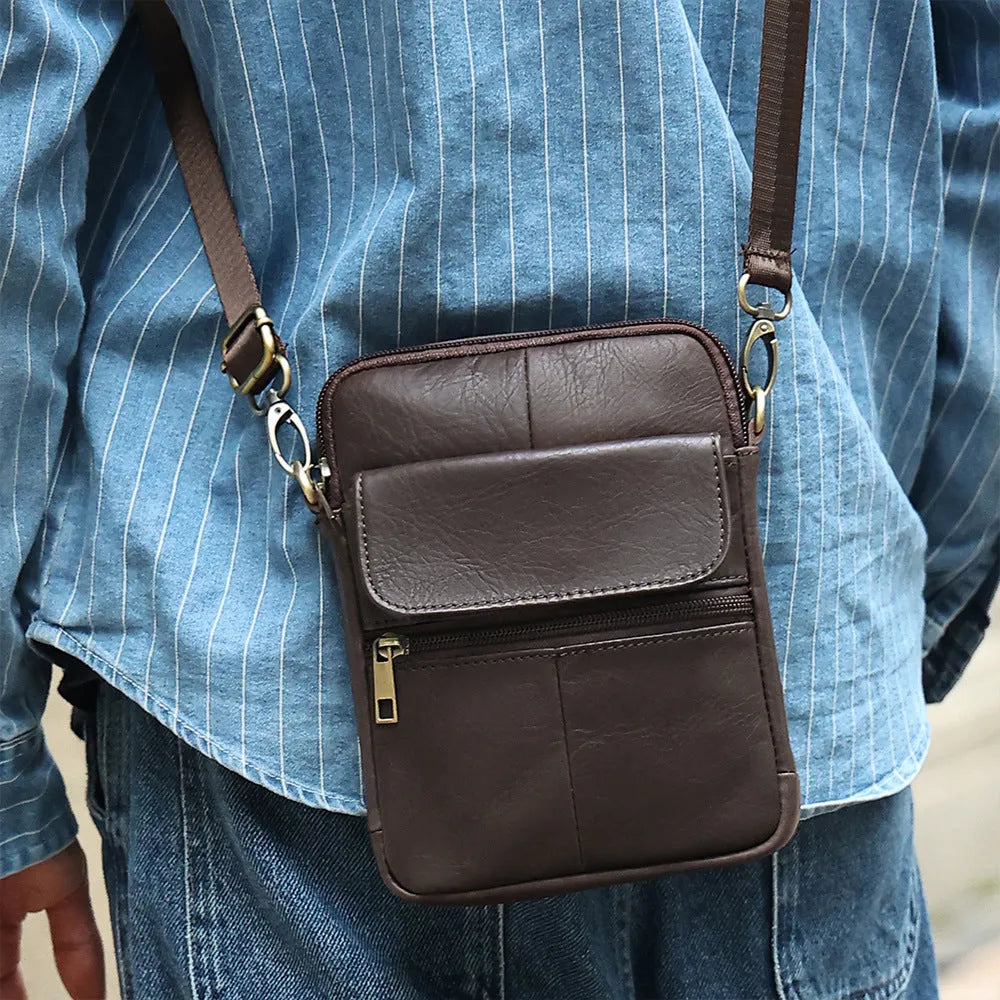 Men's brown leather crossbody shoulder bag with visible sewing lines and polyester cotton lining