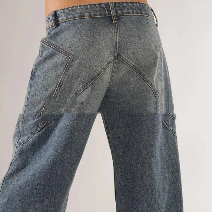 Women's blue cotton wide-leg mop trousers with low waist and splicing detail laid flat.