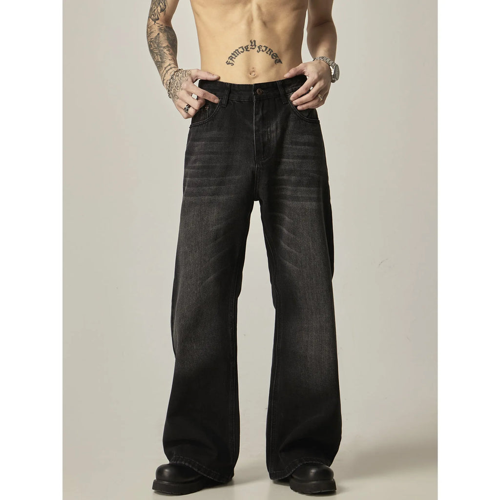 Black loose straight cut retro jeans with zipper fly on mannequin showing full silhouette