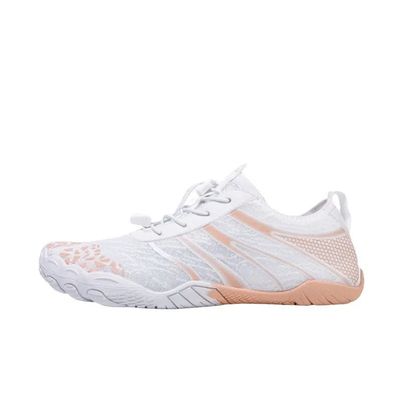 Lycra stretch fabric casual running shoes for men and women on a beach background.