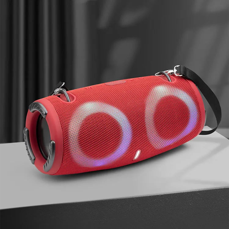 Round portable Bluetooth speaker with RGB coloured lights in camouflage colour option with carrying strap