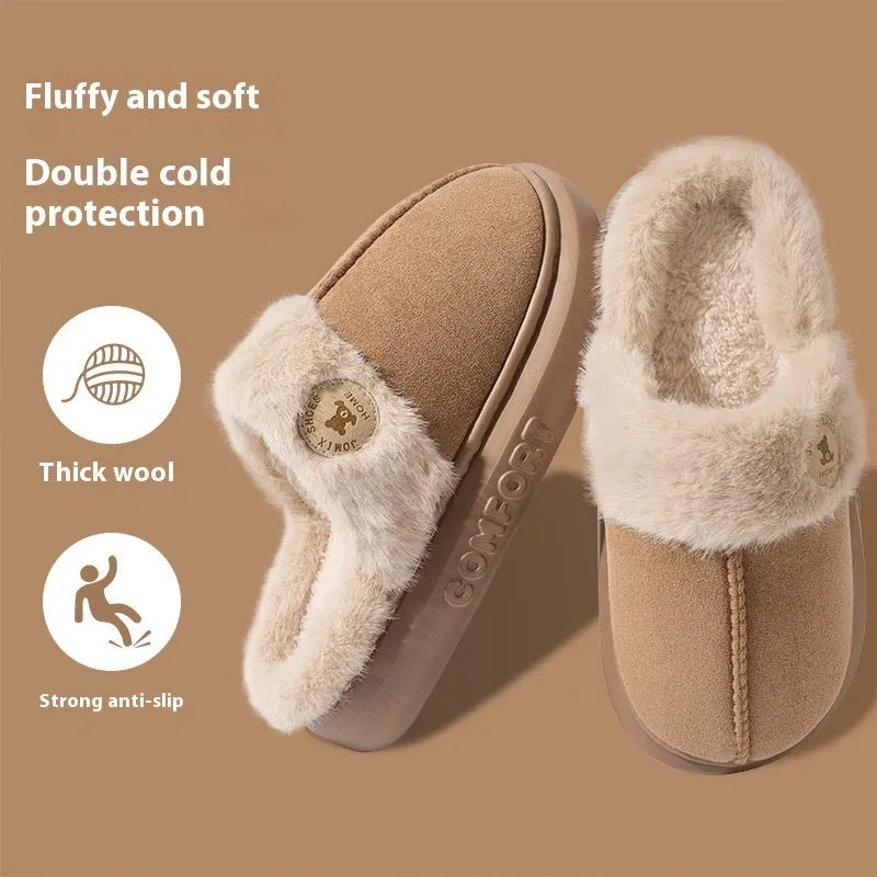 A pair of thick-soled plush fleece slippers in a chosen colour, showing decorative car stitching on the upper.