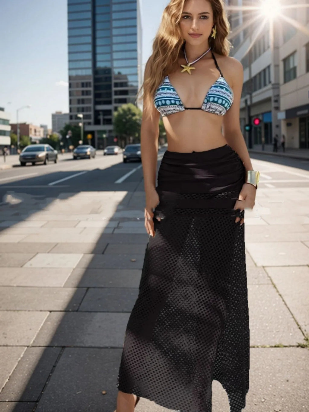 Women's brown gradient fishnet long skirt and bikini three-piece set on a mannequin