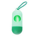 Compact black dog waste bag holder with side hook and velcro base for attaching to trousers or dog collars