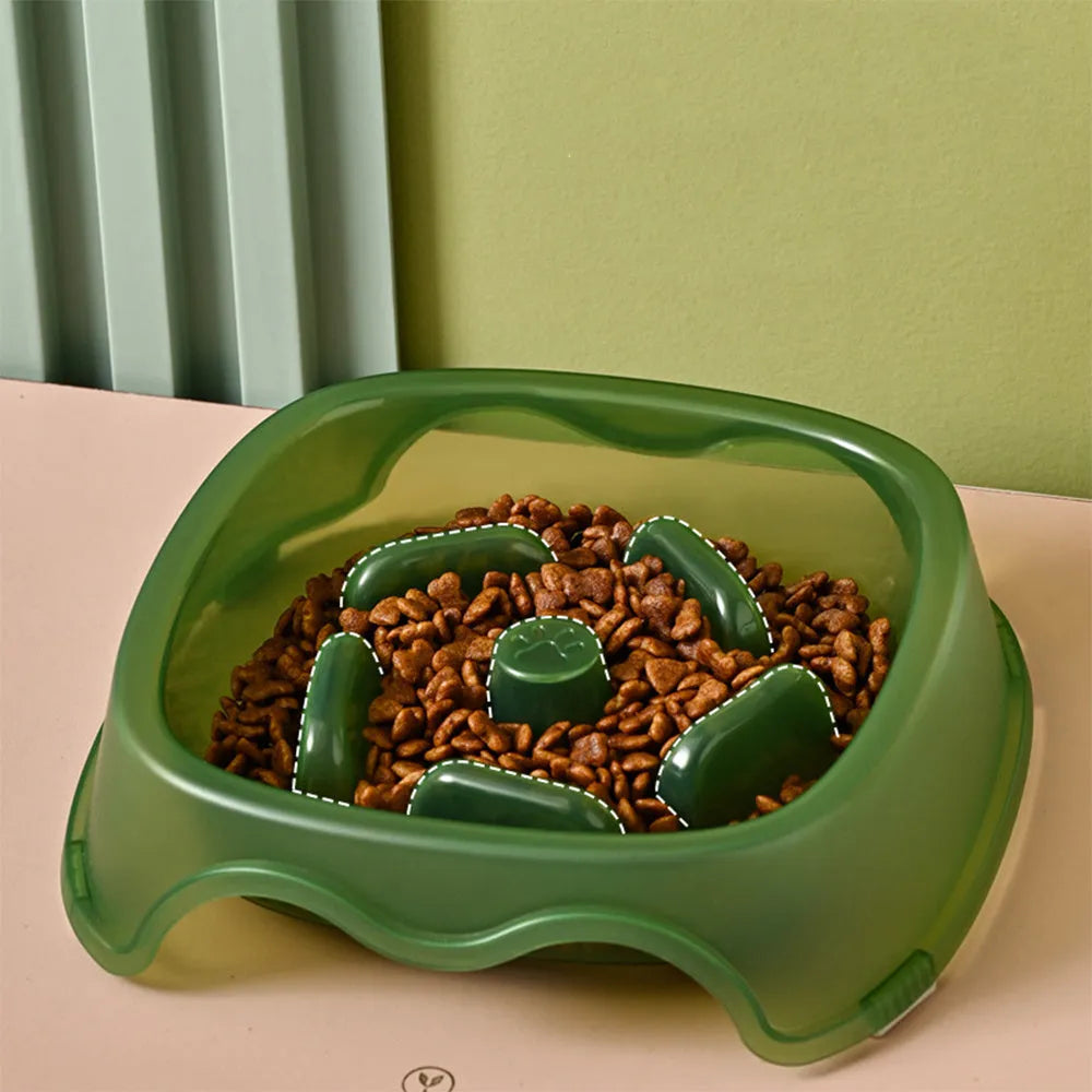Blue plastic dog slow feeder bowl with anti-choking ridge design for puppies and dogs.