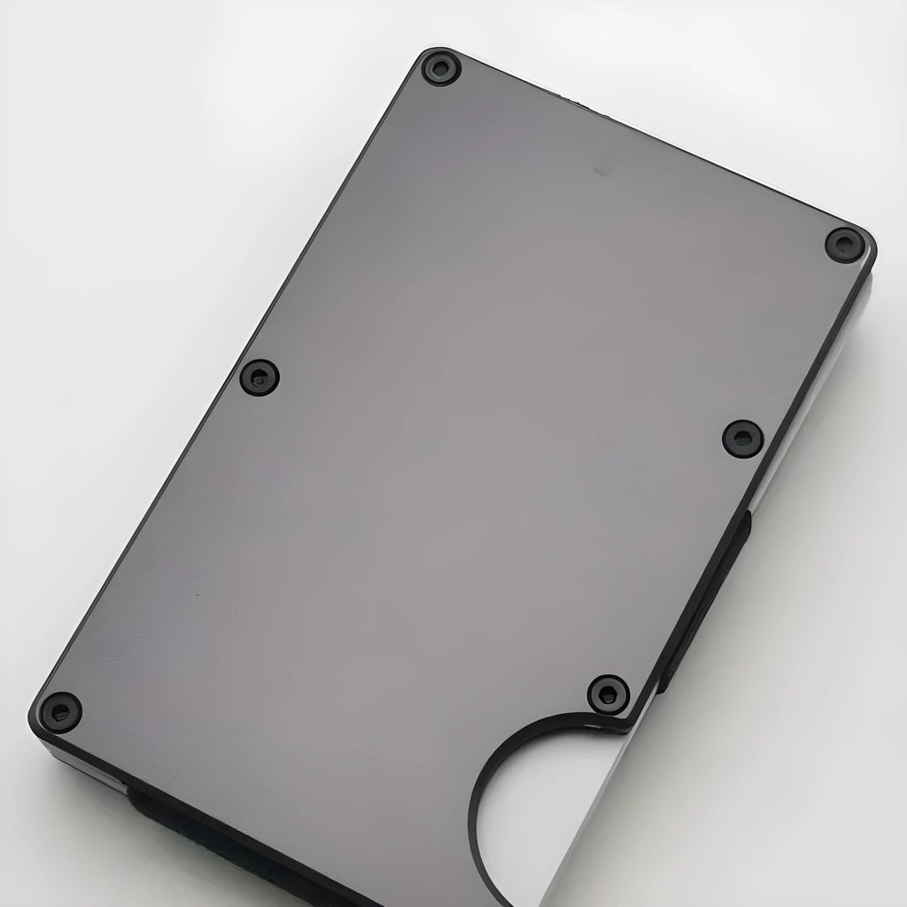 Carbon fibre slim wallet in aluminium alloy grey colour showing RFID blocking and anti-theft features