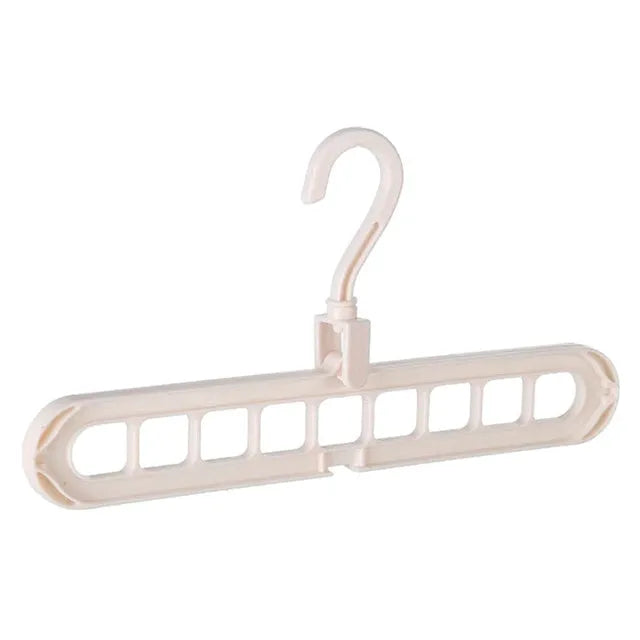 Plastic clothes hanger with rotating hook in assorted colours on white background