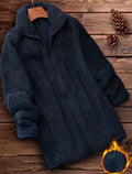 Double-sided velvet fleece jacket in black, shown on a hanger.