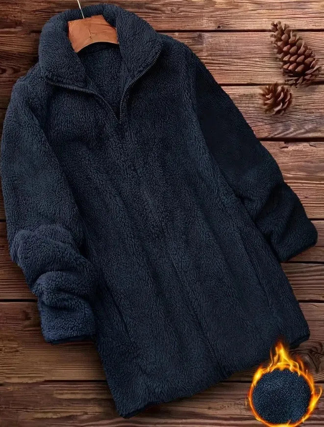Double-sided velvet fleece jacket in black, shown on a hanger.