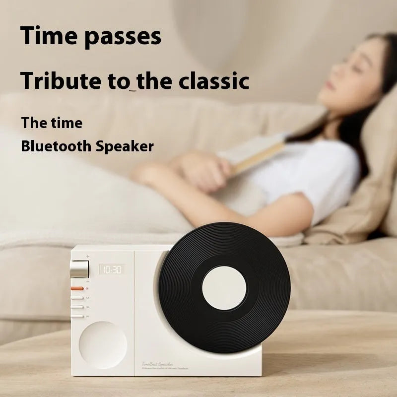 Mini Bluetooth portable speaker in Obsidian Black, Ivory White, Coral Pink or Plum Green colours with USB charging port