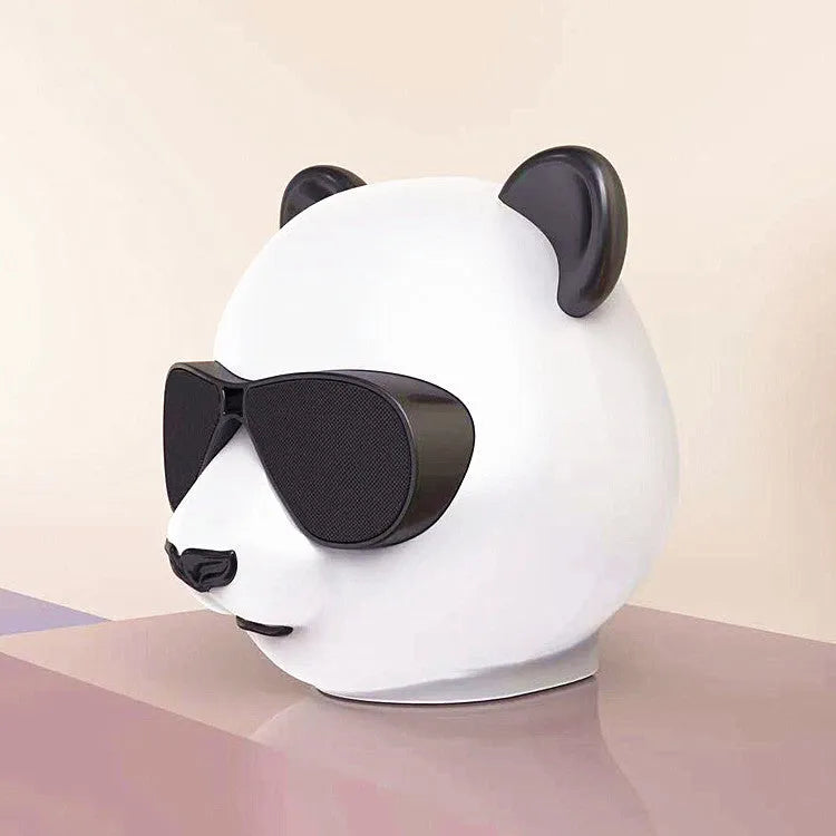 Portable mini Bluetooth speaker with classic style design showing USB charging port
