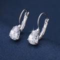 Drop-shaped women's metal earrings with gem inlay in gold or platinum colour