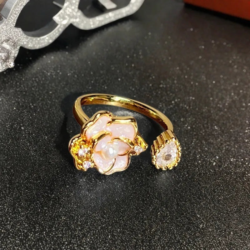 Adjustable vintage oil-dripping gourd copper ring with zircon inlay, showing flower shape in one of six colour options.
