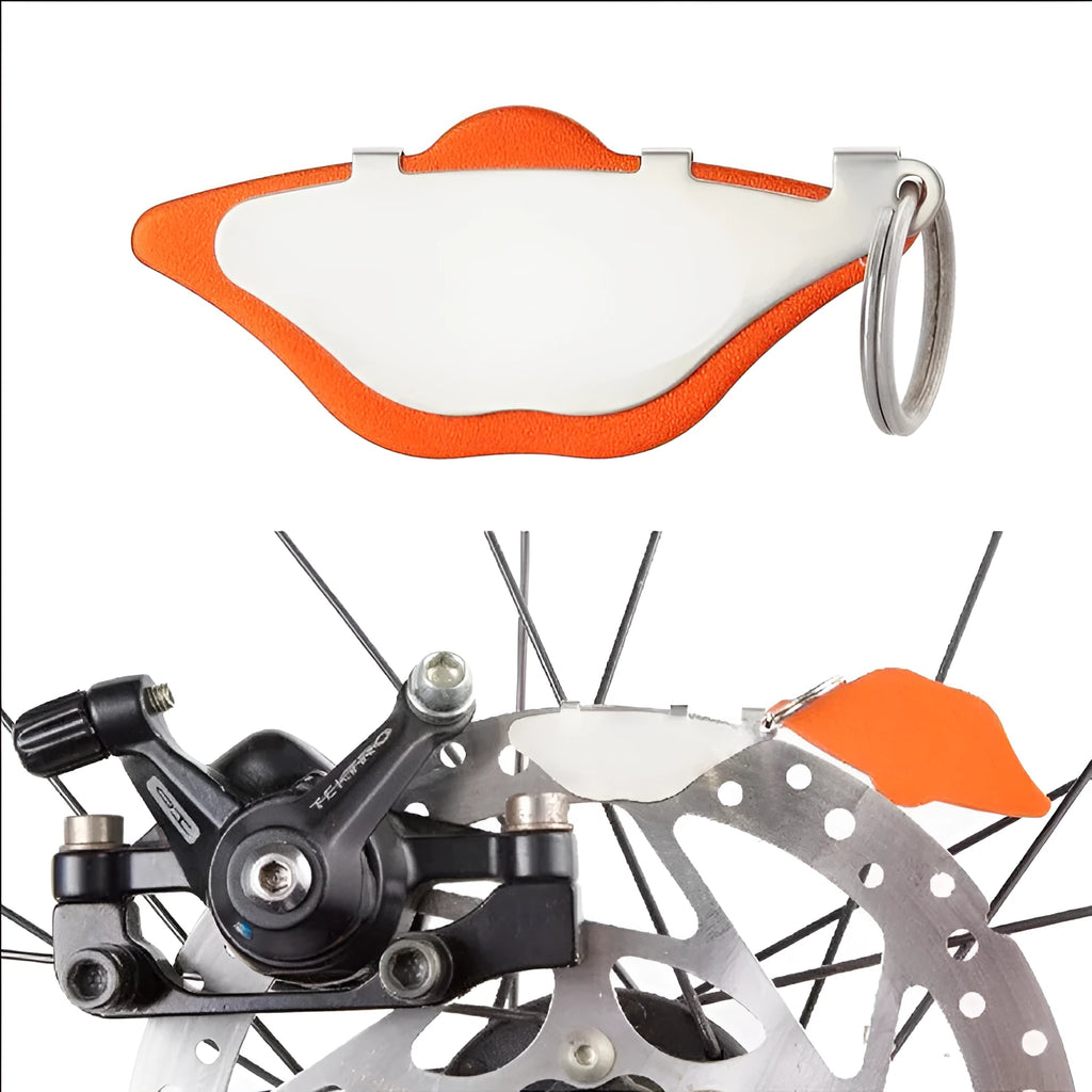 Mountain bike disc brake linings in black and orange colours with scratch proof design