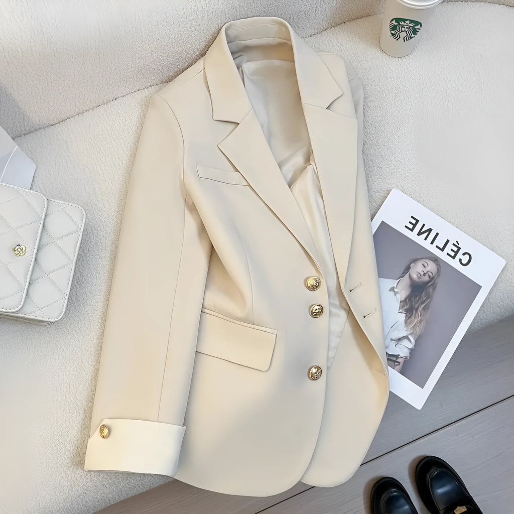 Beige Korean-style loose fit mid-length women's coat with long sleeves and pockets.