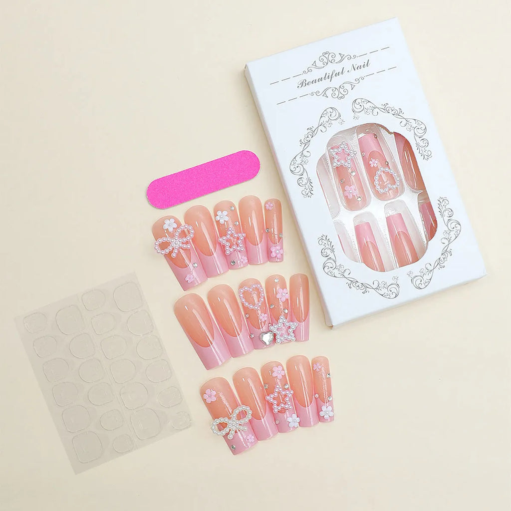 Super long artificial nails with French spot drill, a bow, and a love pattern in colour XB-70-48.
