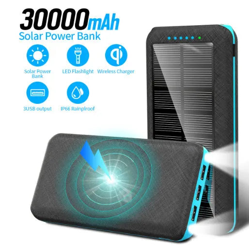Black portable power bank with wireless charging pad on top, three USB ports, and an LED flashlight.