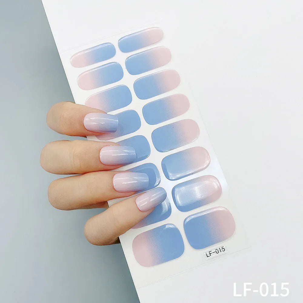Full nail art sticker sheet showing 16 different solid colour designs including European simple nails and floral patterns