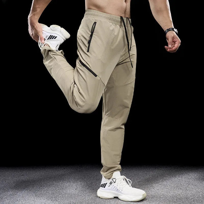Men's waterproof quick-dry nylon exercise trousers in Army Green colour with mid waist design