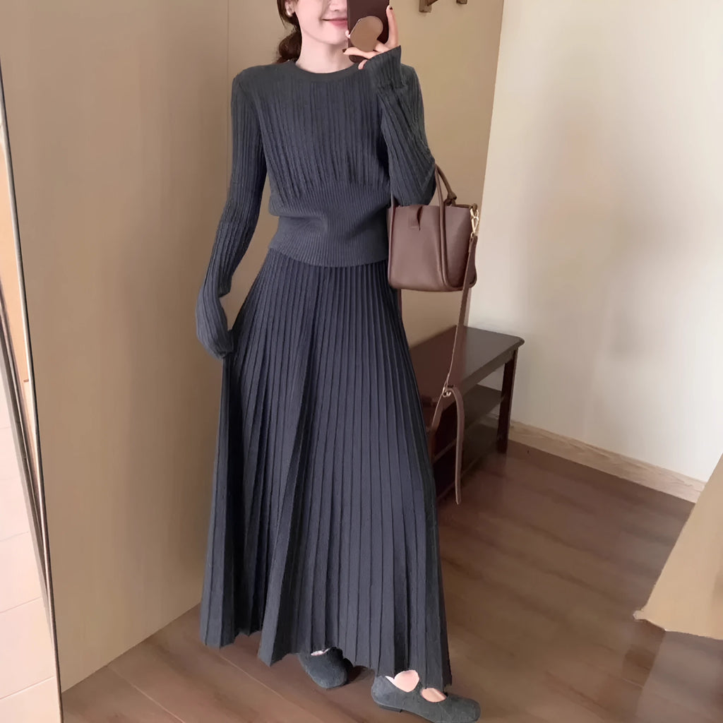 Dark grey knitted long dress suit with artistic retro 3D pattern, showing sweater and skirt.