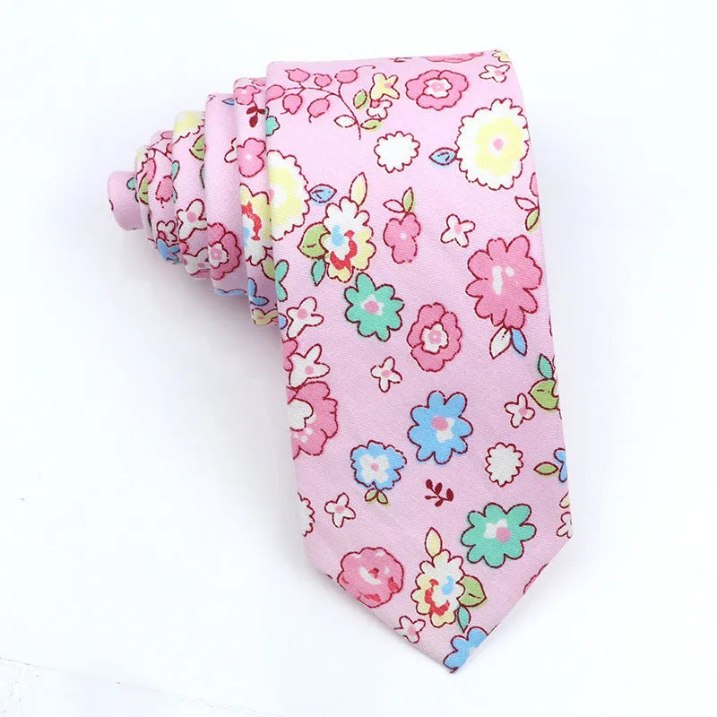 Korean style narrow men's cotton bow tie with a cartoon print pattern on an adjustable neck band.