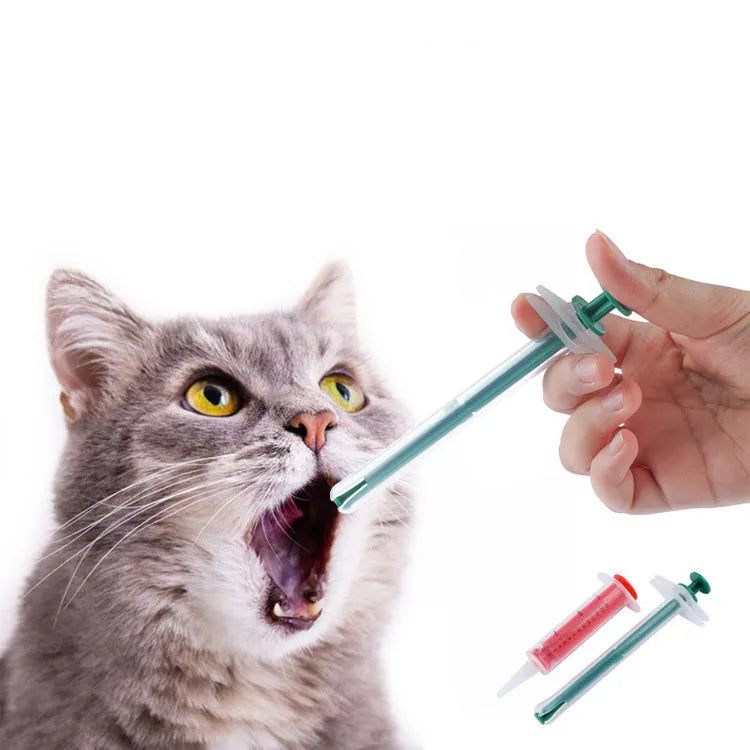 Two silicone pet pill shooter syringes, one 15cm and one 11.5cm, for feeding medication to cats and dogs.