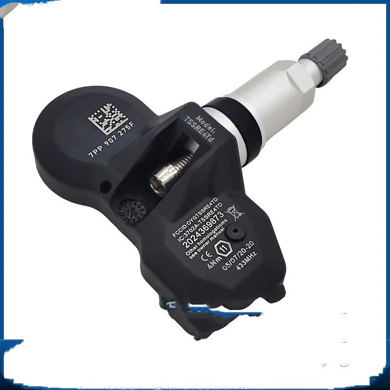 Black Audi tyre pressure monitoring sensor unit for vehicle wheel installation