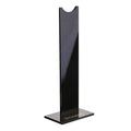 Pink and black detachable gaming headset stand with non-slip silicone base on a desk
