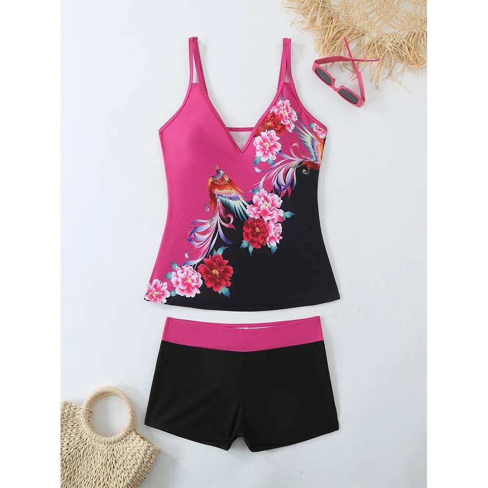 Plus size black printed swimsuit briefs for women on a hanger.