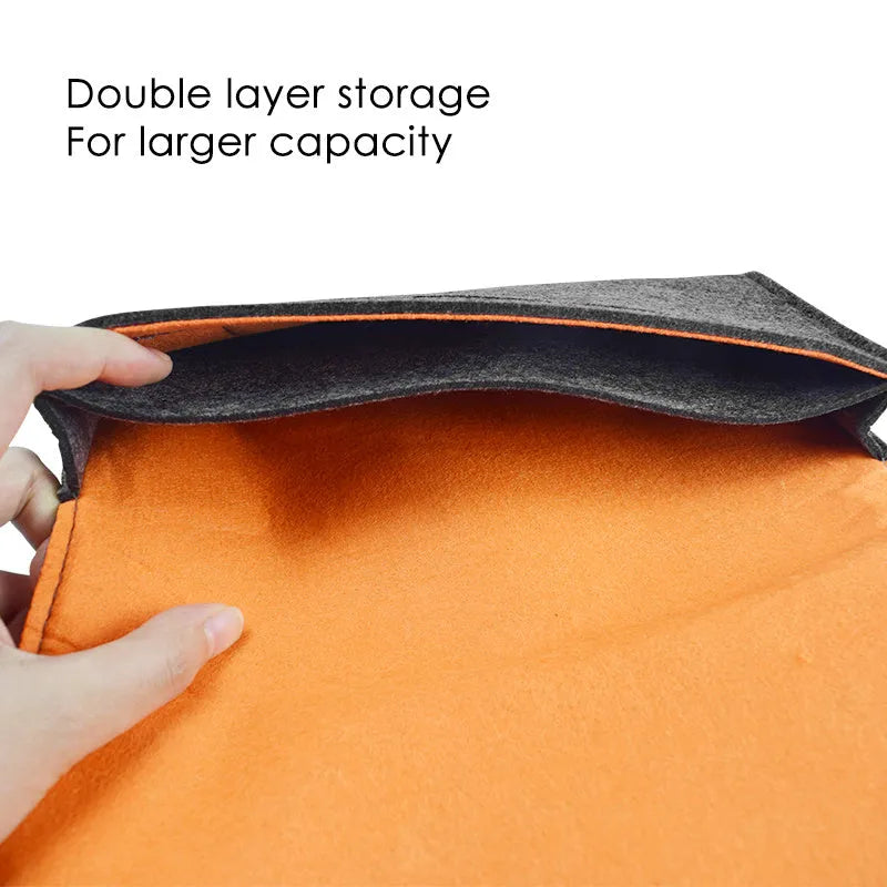 Black felt pouch case for Nintendo Switch open to show console and game card slots
