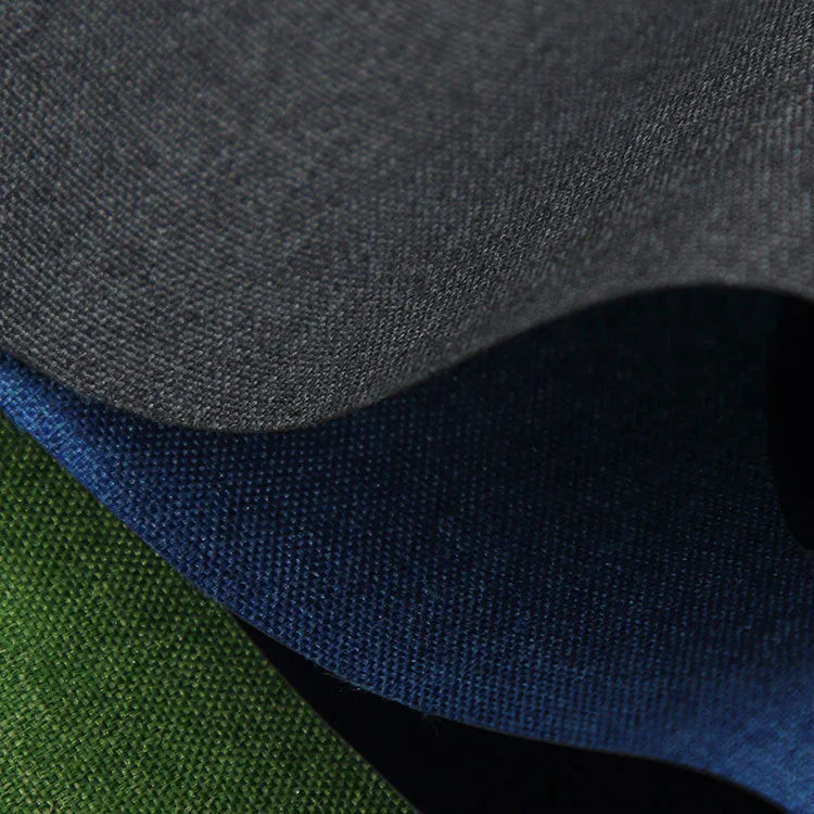 A piece of black, blue, or green polyester ant cloth fabric for luggage and furniture.
